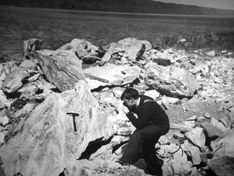 The Minerals of New York City: Irving Horowitz collecting in March 1938 at Dyckman Street rock dump at Hudson River in Manhattan. 